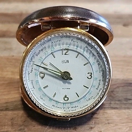 Vintage Elgin World Time Travel Alarm Clock Round Clam Shell Japan WORKS - s l1600