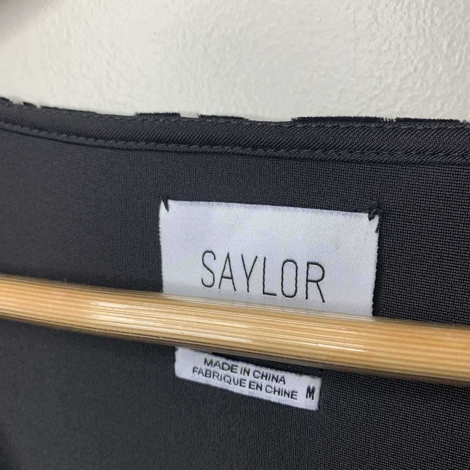 Mameluco de terciopelo negro Anthropology Saylor para mujer manga larga talla mediana Foto 4 de 4