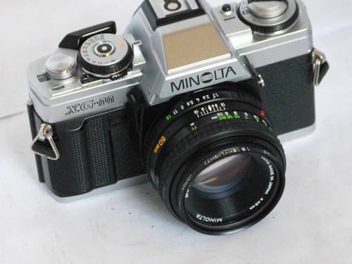 MINOLTA XG-M WITH 35MM LENS 35MM FILM CAMERA with new seal and battery.