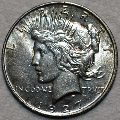 AU-UNC 1927-D Silver Peace Dollar, Fully Lustrous & Barely Circulated.