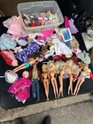 Lot of Vintage Barbies Clothing and Accessories