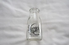 Preowned Voegel's Clear Glass Half Pint Milk Bottle Faribault, Minnesota