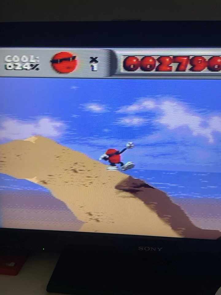 Cool Spot Sega Genesis CIB Complete with manual Hang Tab Tested - Image 2 of 4