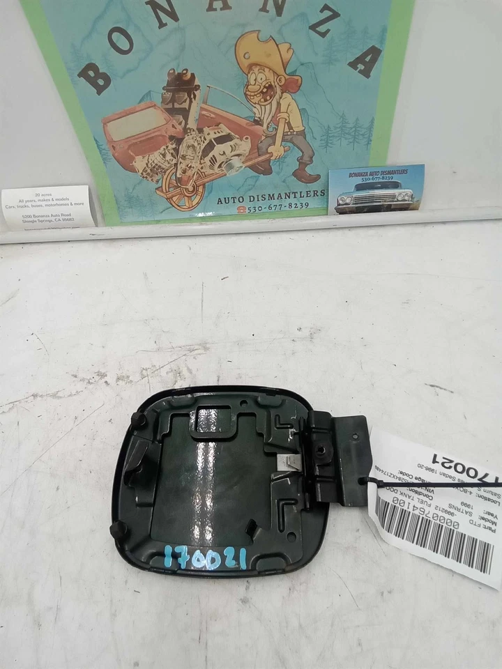 Saturn Serie S 1996-2000 sedán exterior puerta de gasolina usado OEM verde Foto 3 de 3