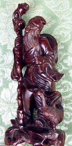 TIEN-KUAI-LI. SANDALWOOD (?) CARVING. CHINA. XX