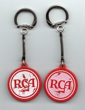 RCA VICTOR &ndash; TWO RCA LOGO KEY FOBS AND KEYRINGS