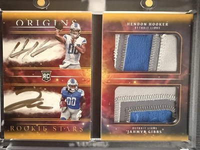 2023 Origins Jahmyr Gibbs Hendon Hooker RPA Booklet /10 gold   tri-color patch