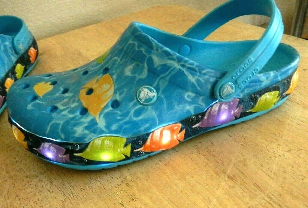 Crocs with best sale fish