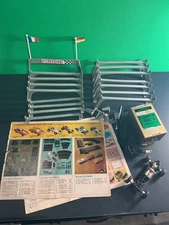 Eldon 1/32 scale Slot Car Lot 1 Chassis, 2 price guides, Transformer, & Supports