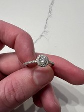 Goldsmiths Platinum 0.50cttw Brilliant Cut Diamond Halo Engagement Ring Size M