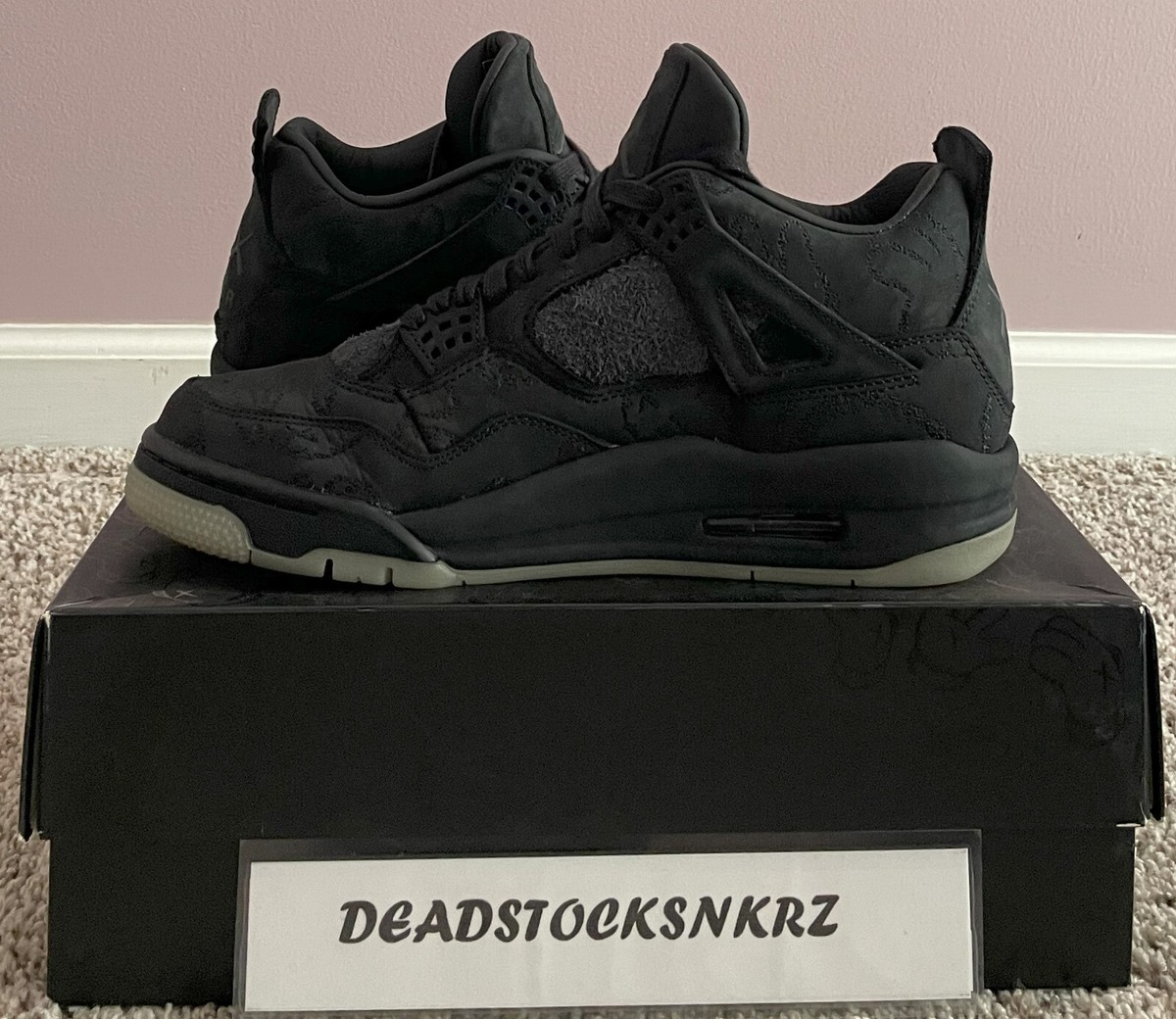 Air Jordan Kaws 4s *Not Deadstock* worn once The Kaws Air Jordan 4s Will Be Available at These Stores | GQ main image 3