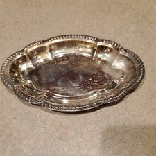 Small, vintage, oval silver-plated serving tray with an ornate pattern