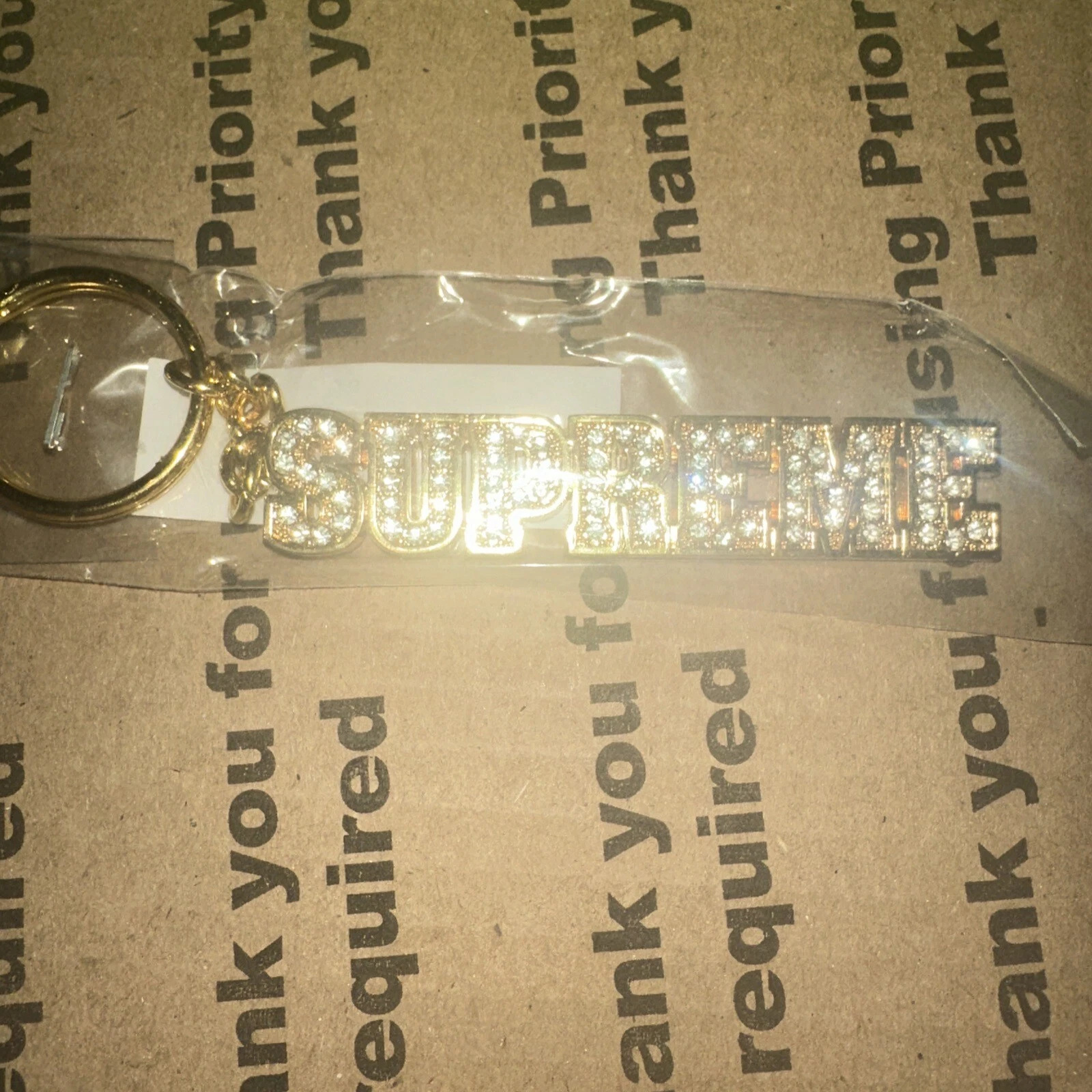 Porte clés logo bloc Supreme SS18   Or