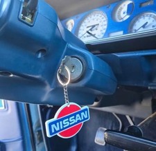 Vintage 1980-90s Nissan keychain pvc soft pla...