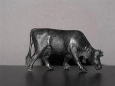 Tim-Mee Cow eating grass.  Black Plastic. 40mm scale