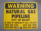 VINTAGE WARNING NATURAL GAS PIPELINE CITY OF BRADY (TEXAS) METAL SIGN