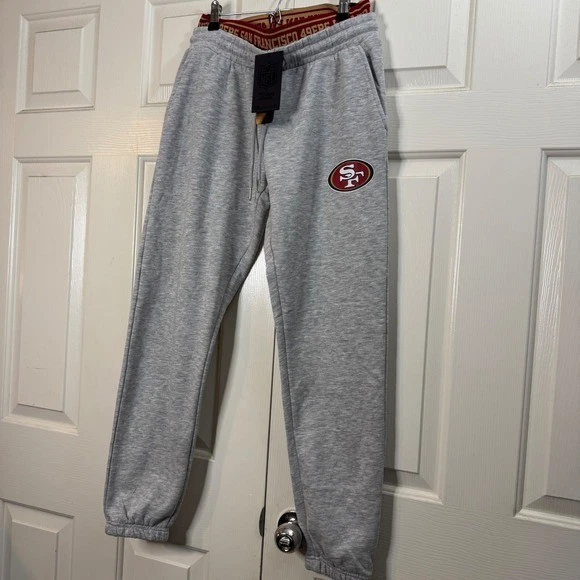 Nuevo con etiquetas Pantalones deportivos para hombre NFL San Francisco 49ers gris polar logotipo cintura talla M Foto 2 de 4