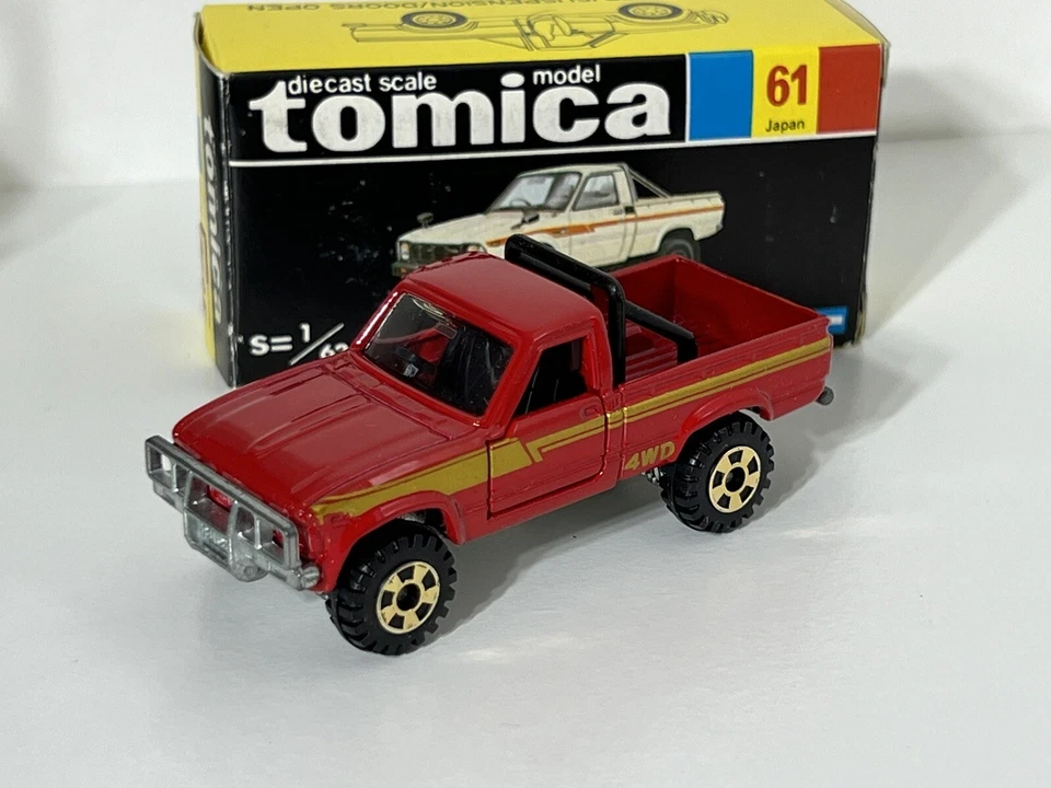 Novo na caixa Tomica Tomy No. 61 Toyota Hilux 4wd picape carro fundido - Imagem 3 de 4