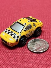 Vintage 1990 Galoob Micro Machines  Spring Back  "Yellow" Nissan Crash Taxi  