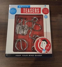Brain Teaser Puzzles Metal 4 Piece Set  Different Challenges