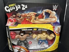 Heroes of Goo Jit Zu Stretchy Superstars Action Figures Roman Reigns Cody Rhodes