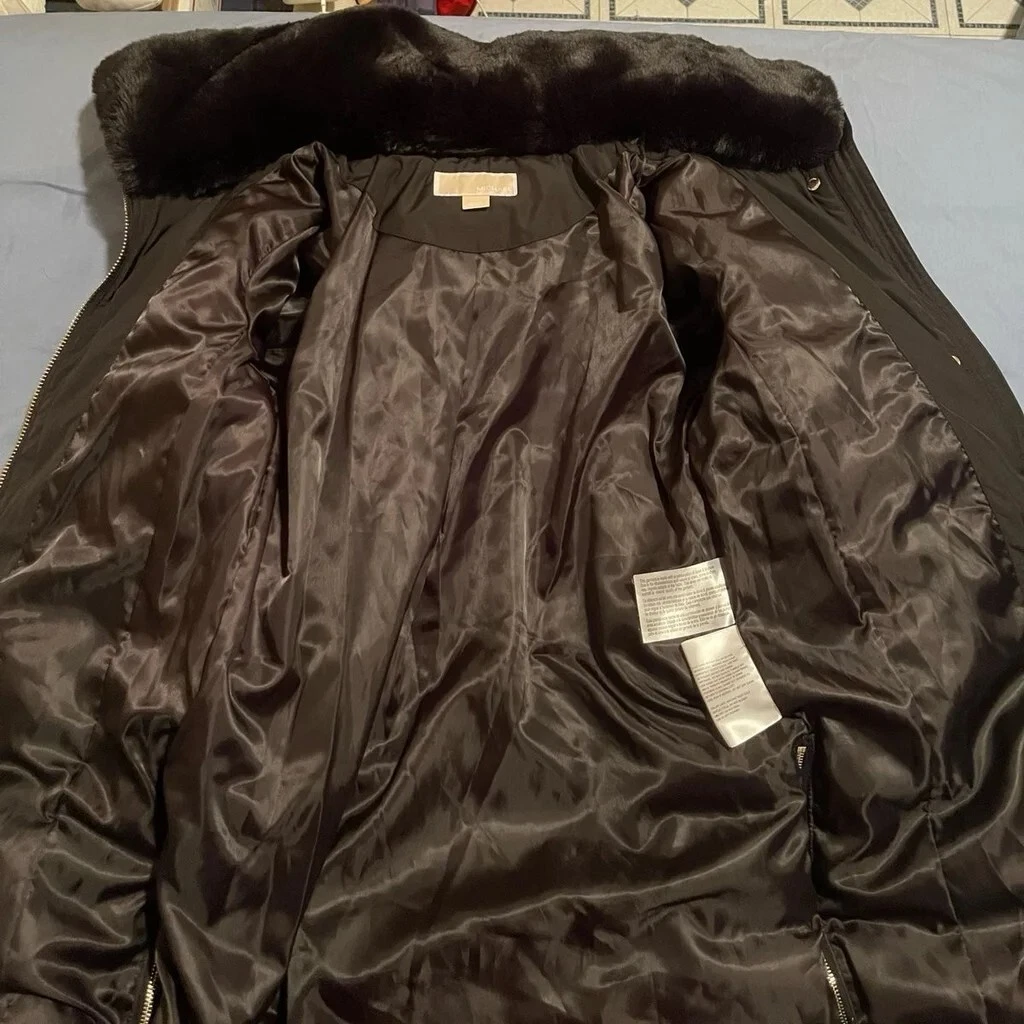 Michael Kors Cappotto laterale cerniera da donna nero con cappuccio nascosto