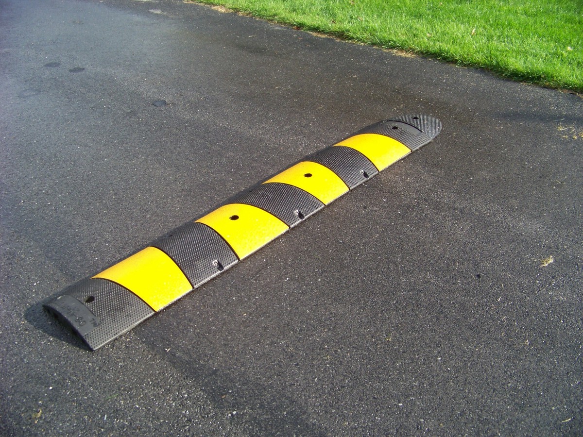 Rubber speed bump, recycled rubber, 6 ft long X 12 wide 2.5 high.