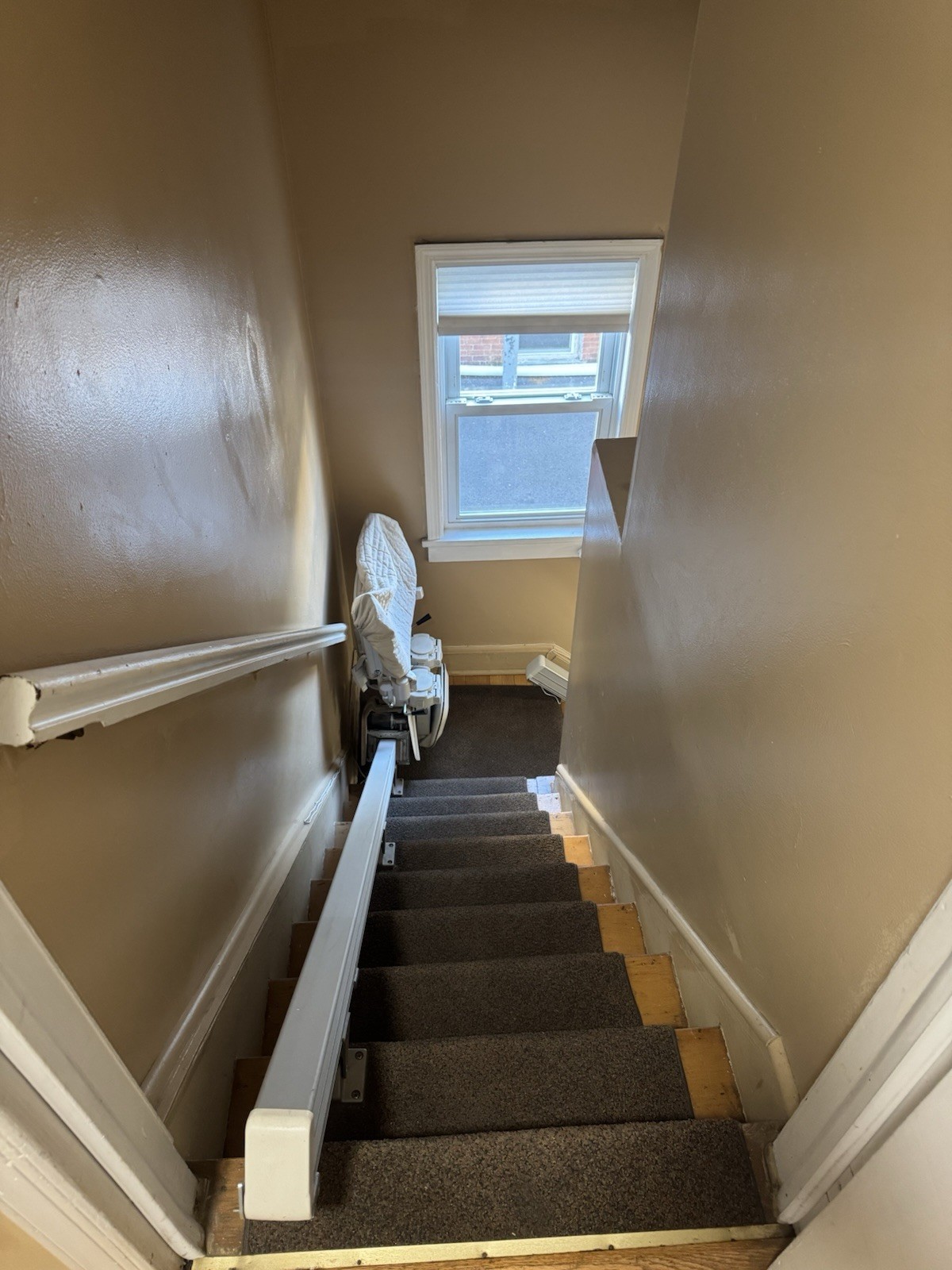 The Handicare 1100 straight stairlift