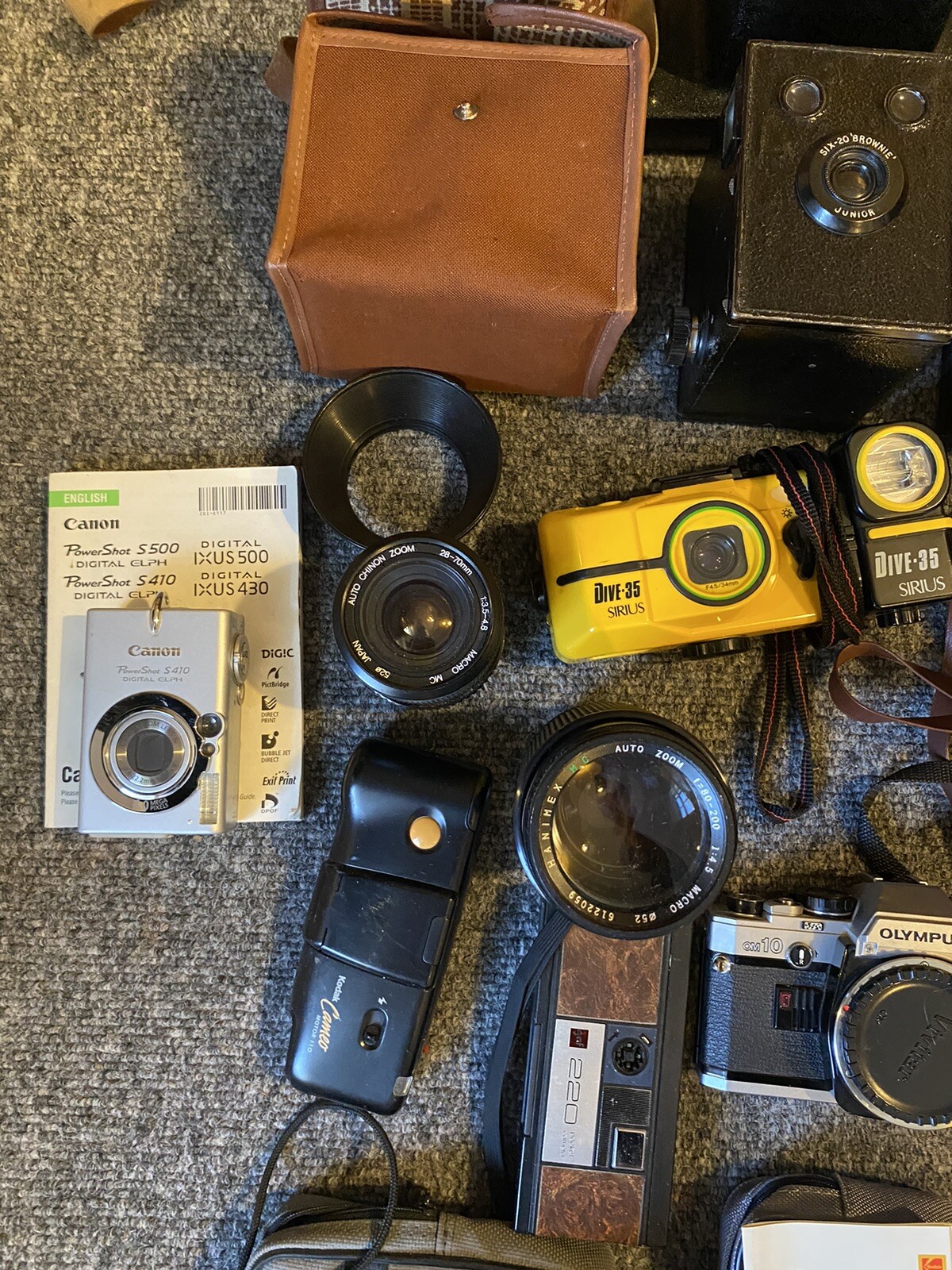 Film camera job lot with lenses and accesories Olympus, Zenit, Canon