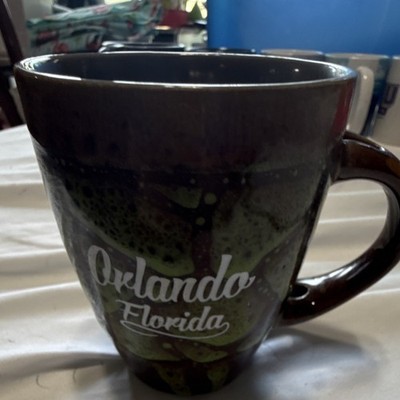 T.I.G.E. Brown Green Ceramic Coffee Mug Orlando Florida Abstract Pattern Round