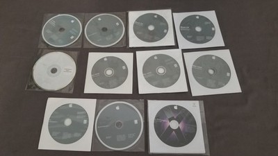Lot Of 11 Apple Mac Install Discs, OS X 9, PowerBook G4, iBook, Mac Mini