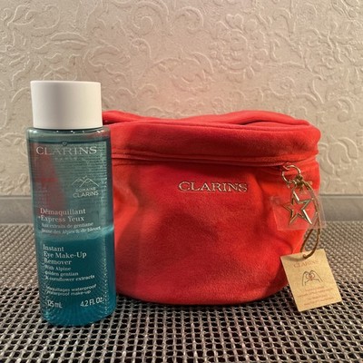 Clarins 2 Teiliges Set Eye Make Up Remover 125 ml und runde rote Kosmetik Tasche