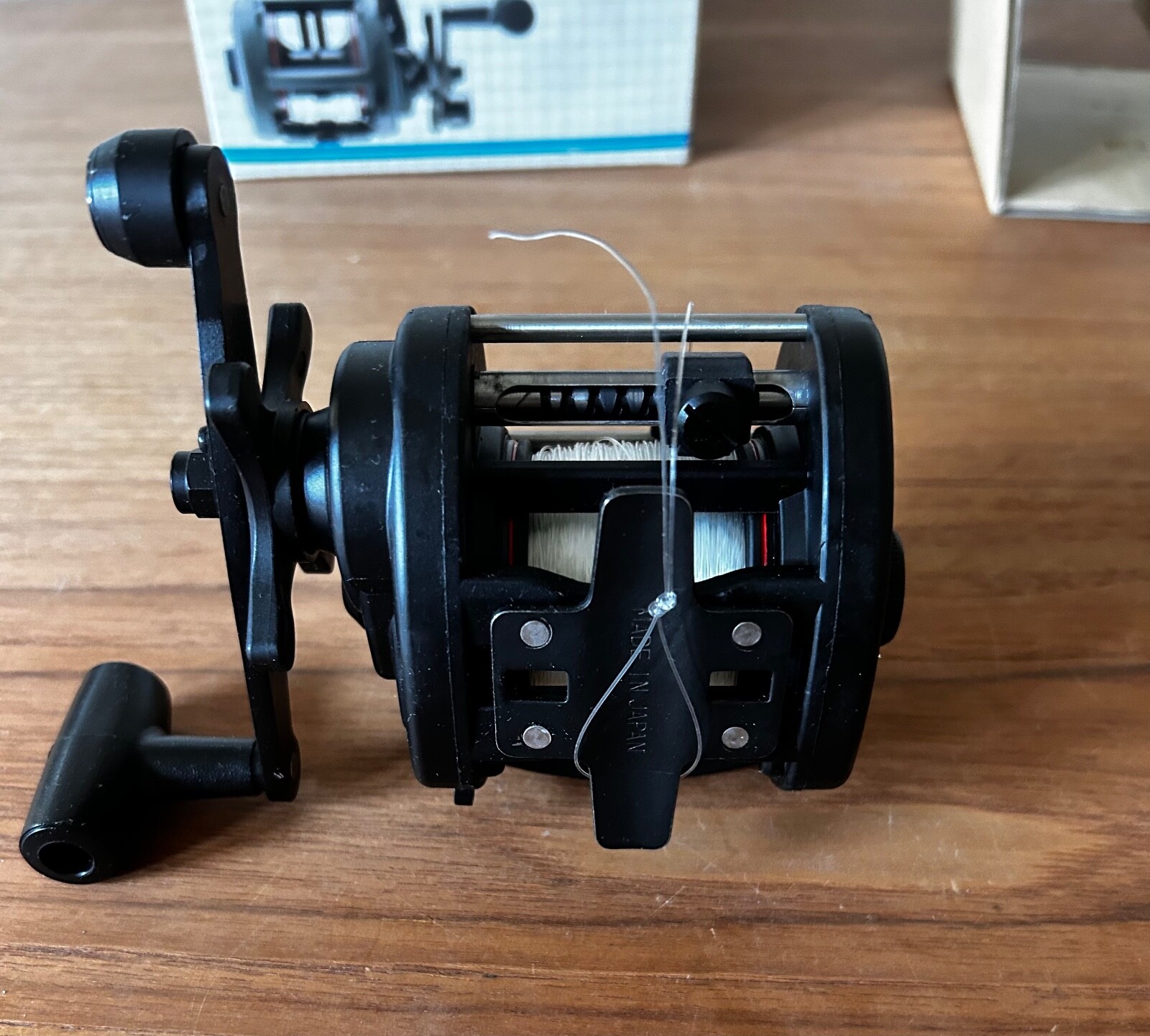 RYOBI SL 220 TROLLING REEL - ORIG BOX W/PAPERS AND TOOLS - PRESPOOLED UNUSED