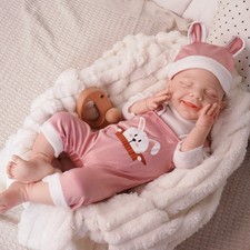 18-inch silicone rebirth doll, adorable smiling baby girl with closed eyes.