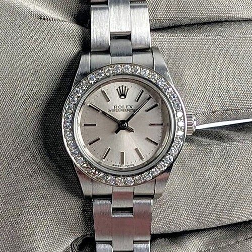 Rolex Ladies Oyster Perpetual 25mm Silver Dial Dimaond Bezel 76080