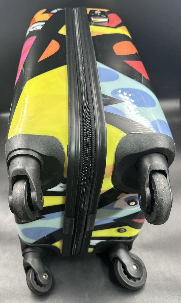 Heys A New Day 21" Transparent Carry On Luggage Spinner Romero Britto Hard Shell