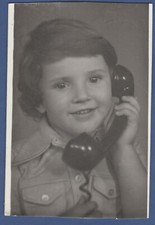 Beautiful girl with cute smile with phone, Cute Kid Soviet Vintage Photo