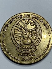 2009 LAZER FX - LASER TAG - IT'S BETTER IN THE DARK ARCADE TOKEN (#s01)