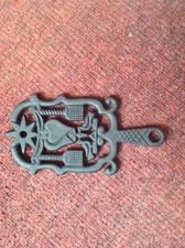Vintage Japan footed cast iron kitchen trivet 