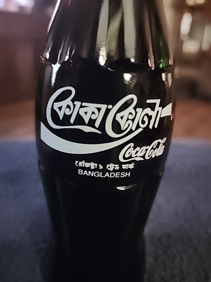 Coca Cola Bottle - 1990 Around the World 6.5oz Bottle