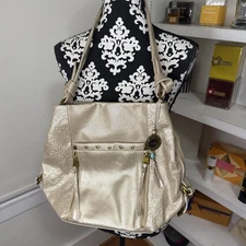 The SAK Metallic Champagne  OJAI Leather Shoulder Hand Bag w/ Charm + Brass NWOT