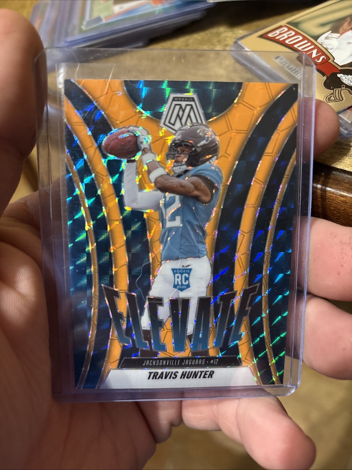 2025 Panini Mosaic - Elevate Travis Hunter #1 Orange Fluorescent Mosaic Prizm 