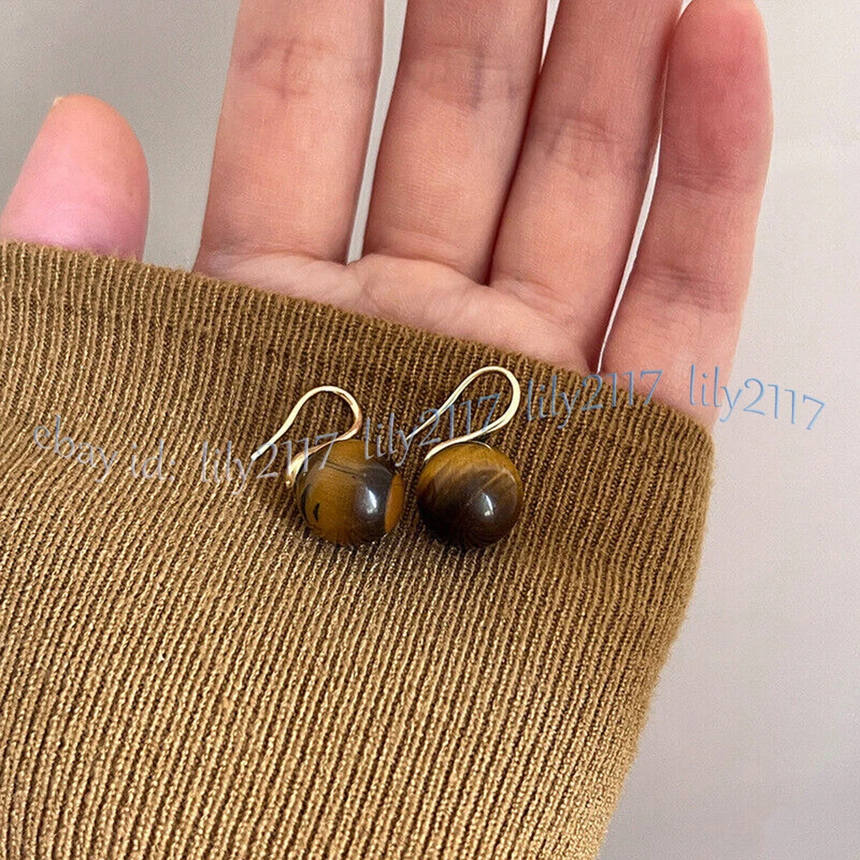 Pendientes colgantes de gancho de oro con cuentas redondas de piedras preciosas ojo de tigre amarillo natural de 10 mm Foto 2 de 4