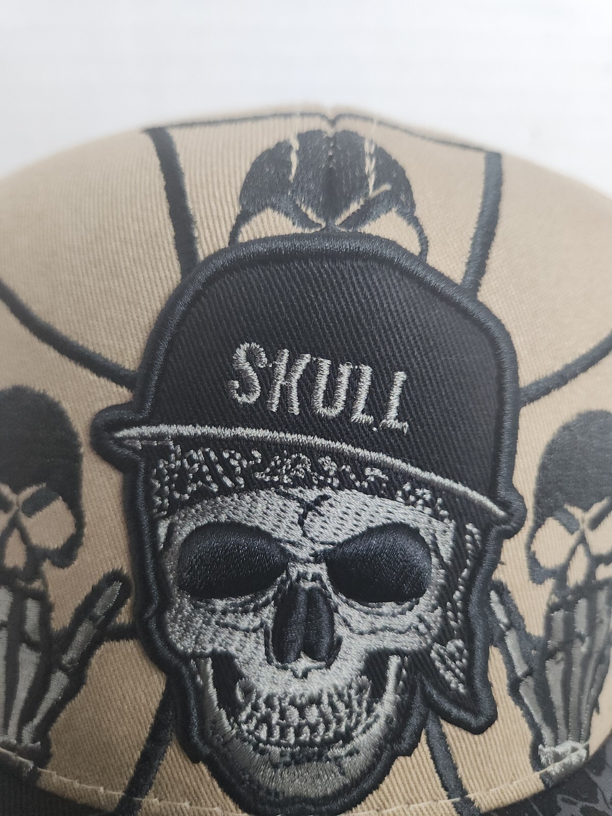 Embroidered skull patch baseball cap with snapback closure-image