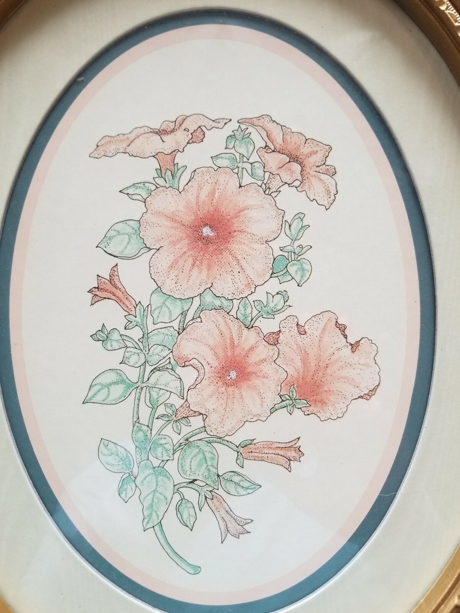 A gold frame with flowers and a picture of flowers | Premium AI