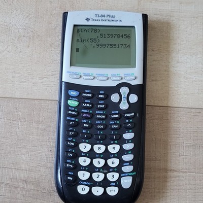 Texas Instruments TI-84 Plus Graphing Calculator Black Scuffed screen Works fine