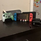 New ListingNintendo Switch Bundle: Console, Joycons, Dock, Controller, Cord, & 3 Games.