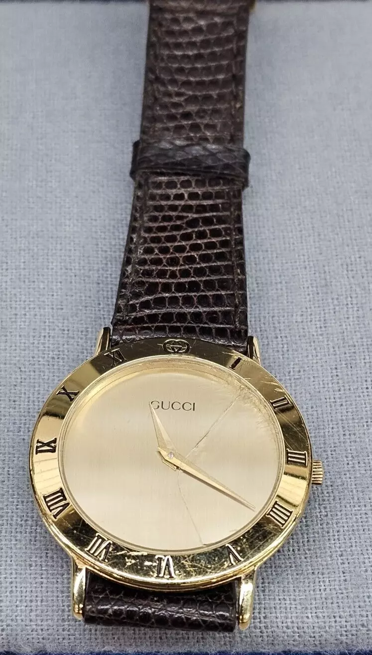 Montre Gucci 3002,2.M plaque d'or vintage à collectionner