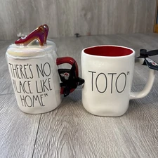 Rae Dunn Lot of 2 WIZARD OF OZ Mugs THERE’S NO PLACE LIKE HOME W/ Topper & TOTO