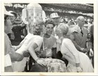 "Takes a Buss after '500' Victory" 1954 Bill Vukovich, Marie Wilson photo